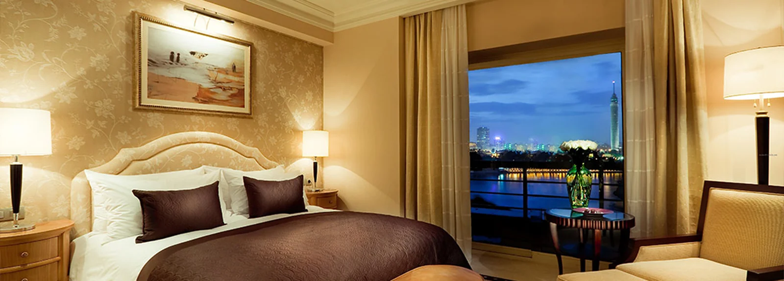 A premium hotel room overlooking a Canadian city skyline